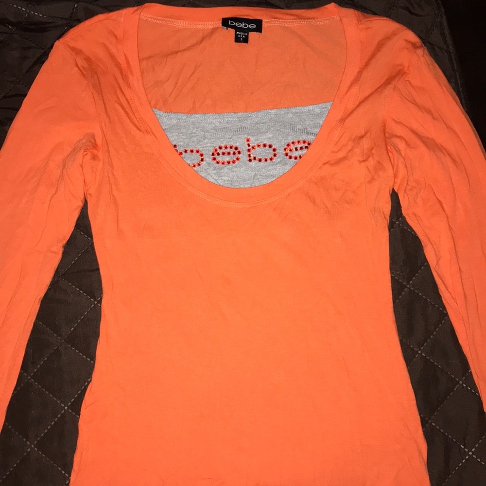 Bebe long sleeve tee in bright orange